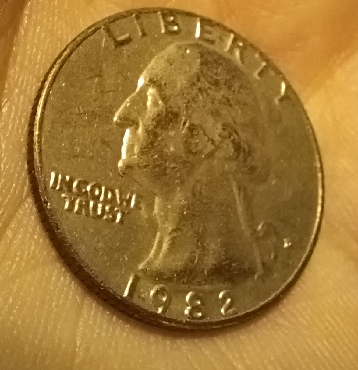 1982-Quarter-With-Copper-Showing-Through-Face.-Cladding-Error?